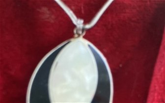 For sale: Victorian style mother of pearl necklace in a gift box.