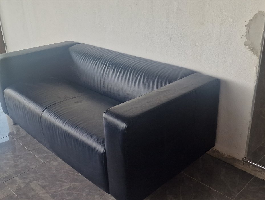 For sale: Black faux leather sofa's