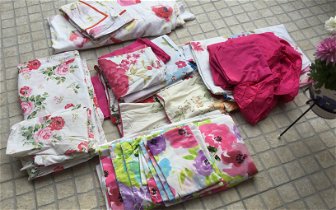 For sale: Several double duvets covers, 2 sets of curtains, pink rugs, pillow cases..