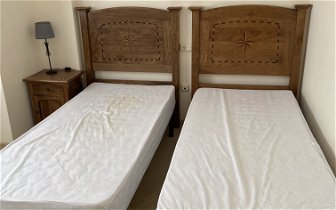 For sale: Two Single solid oak headboards and tw f solid headboards with a matching solid oak chest of drawers.  With one matching solid oak bedside cabinet.