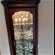For sale: Tall corner glass display cabinet.excellent condition