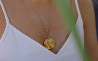 Lost: LOST gold necklace on Portinatx beach - Aug 26.