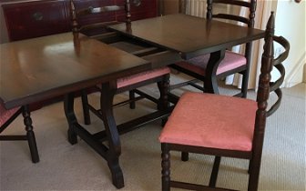 For sale: Free, dark wood table that extends & 4 chairs