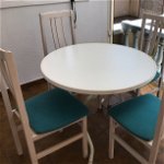 For sale: 4 wooden chairs blue seats white plastic table good condition