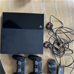 For sale: Sony Playstation PS4 together with 6 games, two controllers and independent Sony controller charging dock.