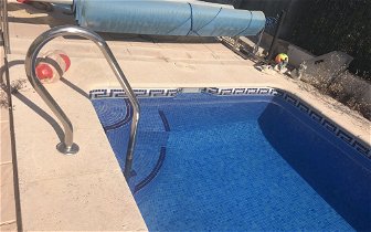 For sale: Two pool covers including holder