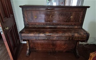 Free brown piano available for collection only