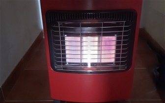 For sale: Red gas fire