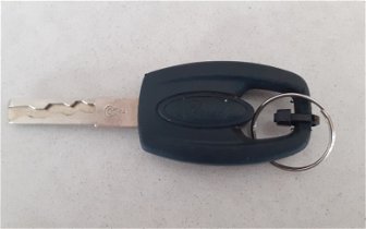 Lost: Car key. No key fob. Black plastic 'handle?'