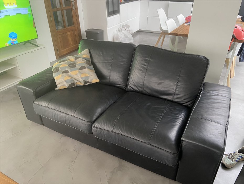 For sale: Black leather couch in good shape