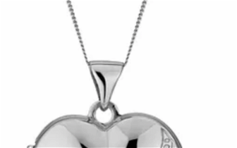 Lost: White gold heart locket with pic of baby inside. Believed to have been lost on Epsom downs/tadworth area