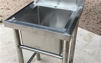 For sale: Utility kitchen prep. 1right drainboard , cross legs & faucet. Bowl silver 50x50 x 8c.