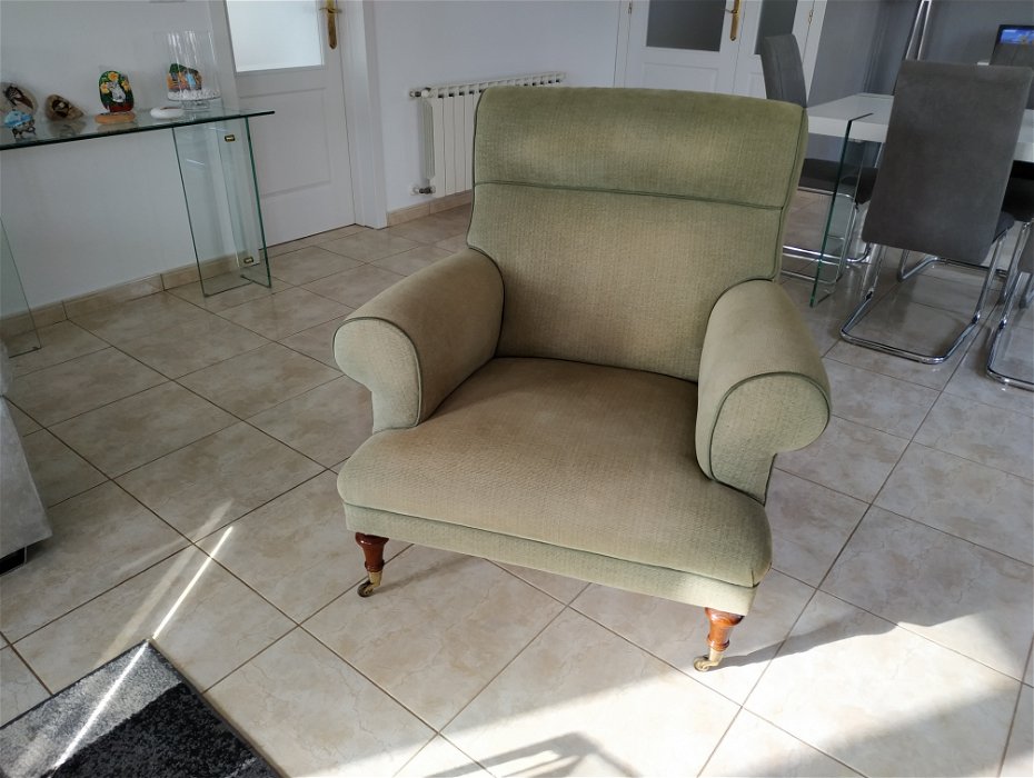 For sale: Green comfy armchair.