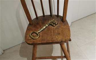For sale: To sell art Deco chair with brass ke