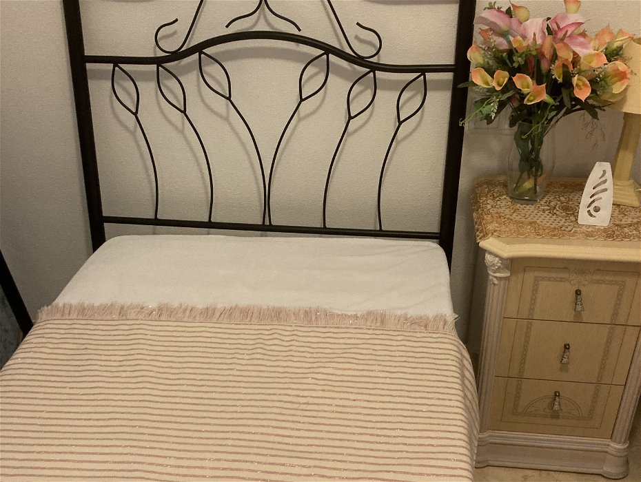 For sale: Two single beds with headboards and mattresses