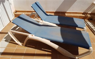 For sale: 2 poolside sunloungers