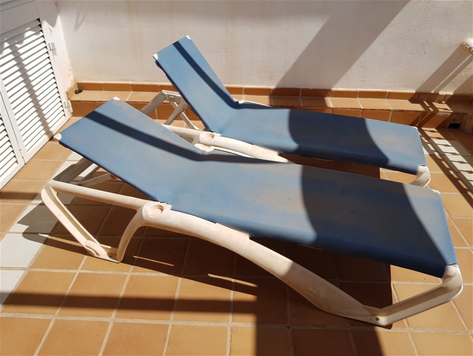 For sale: 2 poolside sunloungers