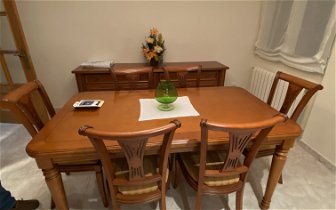 For sale: Wood dining table with six chairs.