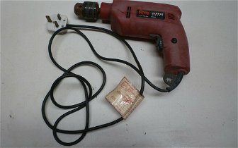 For sale: electric drill with hammer action , good condition with chuck key . Can deliver